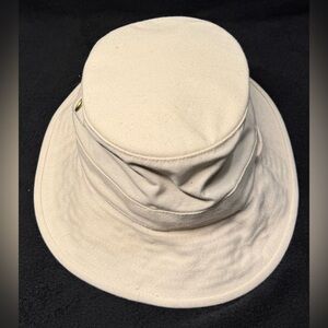 Tilley cream colored bucket hat.  Used in good condition.